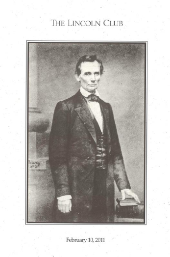 Black and white portrait of Abraham Lincoln in formal attire.